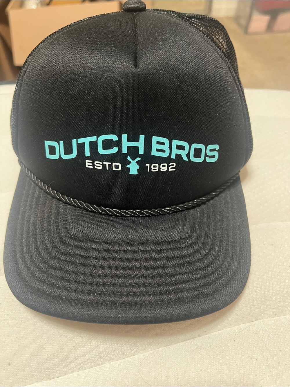 Dutch Bros Black Cap with Teal Logo